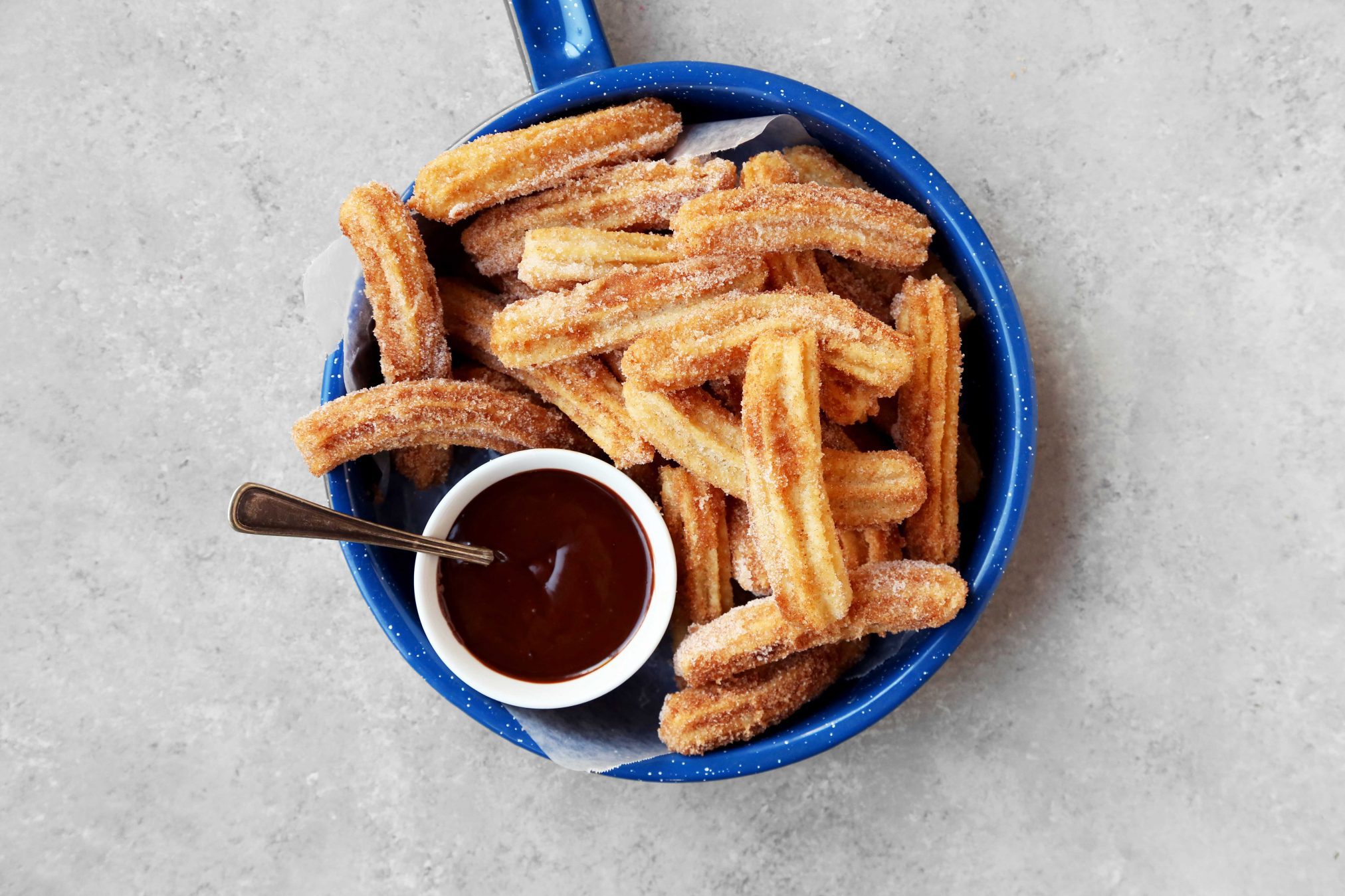 Fry the churros and drain on paper towels as described earlier. 